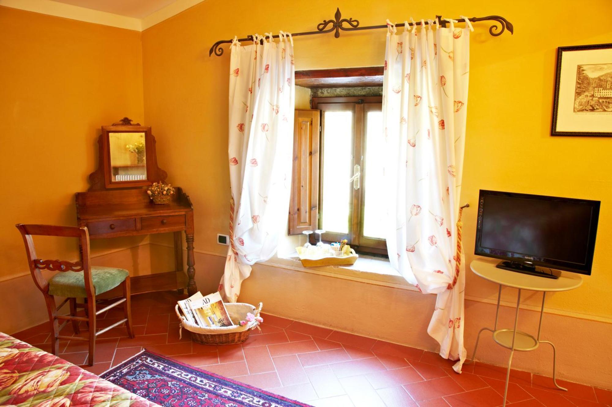 Relais Villa Belpoggio - Residenza D'Epoca Loro Ciuffenna Oda fotoğraf